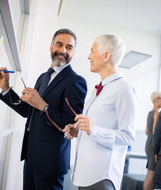 portrait-of-happy-business-people-discussing-toget-3EGU2XM.jpg